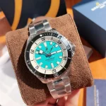 BLS Factory Breitling Superocean Watch with Turquoise Dial, Black Bezel, and Stainless Steel Bracele